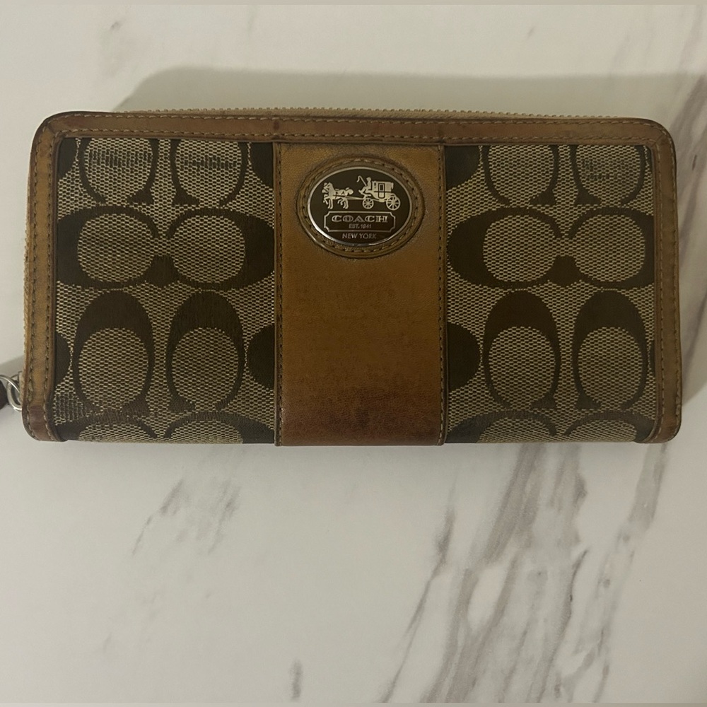 Coach Signature Zip Wallet with Tan leather. Inside is clean!